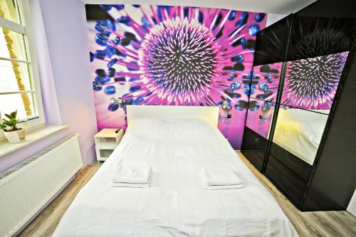 Tempat tidur dalam kamar di Grand Apartments - Malibu - Apartment located 5 minutes from the sea