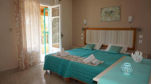 Krevet ili kreveti u jedinici u okviru objekta Artemis Apartments ( Yiannis House)