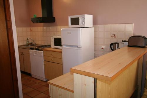 Una cocina o cocineta en Gîte ABODI du Chalet Pedro