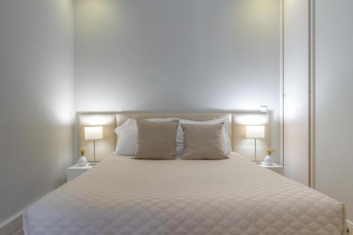 Un ou plusieurs lits dans un hébergement de l'établissement Oporto View Apartments
