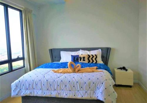 Letto o letti in una camera di Woodsbury homestay Studio 57 Butterworth