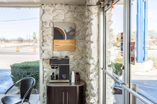 a coffee station in the lobby of a building at Motel 6 Fort Worth, Tx - Stockyards in Fort Worth