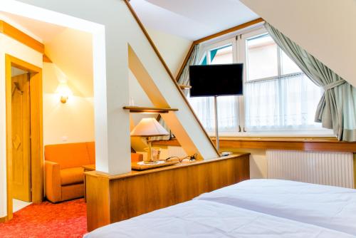 Postel nebo postele na pokoji v ubytování Hotel Pendl
