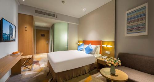 Postel nebo postele na pokoji v ubytování Holiday Inn Express Suzhou New District by IHG