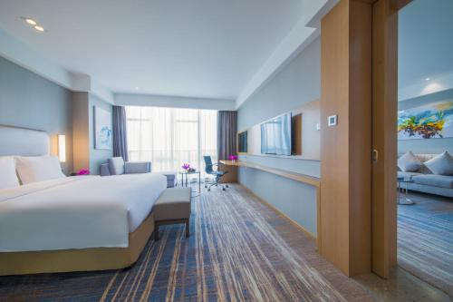 Ένα ή περισσότερα κρεβάτια σε δωμάτιο στο Holiday Inn Express Guian Yungu by IHG