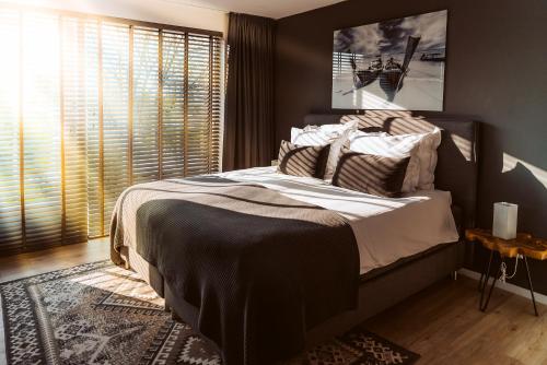 Postel nebo postele na pokoji v ubytování B&B Bleiswijk