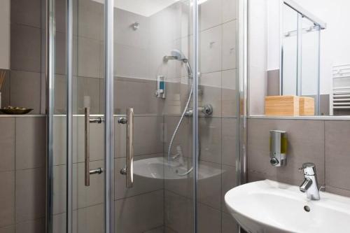 Ванная комната в SC 5 Cozy Family & Business Flair welcomes you - Rockchair Apartments