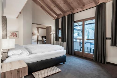 מיטה או מיטות בחדר ב-Hotel Bad Schörgau