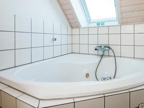 A bathroom at Holiday home Juelsminde LXI