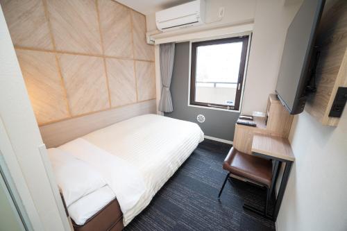 Katil atau katil-katil dalam bilik di Super Hotel Kobe