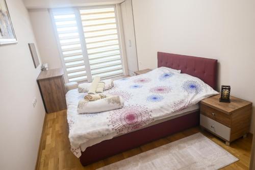 Postelja oz. postelje v sobi nastanitve Mitreski Impeksel Luxury Self Check-in Apartment