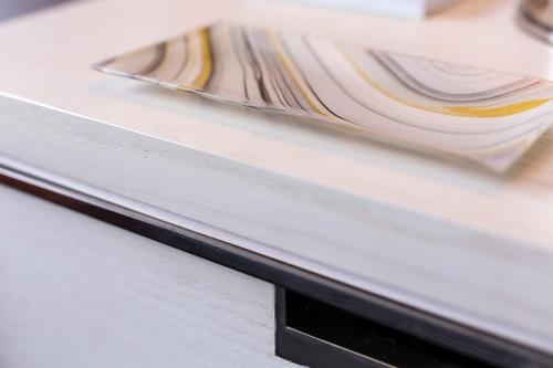 a pile of paper sitting on top of a table at Four Seasons Hotel Atlanta in Atlanta