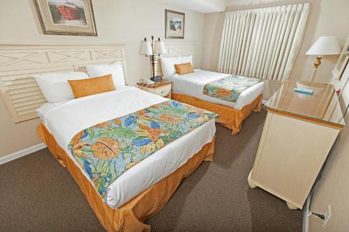 Voodi või voodid majutusasutuse Atlantica Resort toas