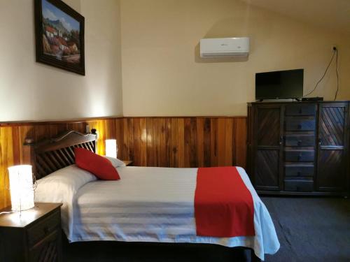 Postel nebo postele na pokoji v ubytování Hotel Campestre Don Luis