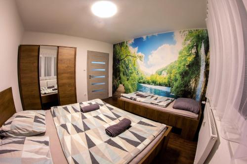 Postel nebo postele na pokoji v ubytování Modern Apartment Klatovy