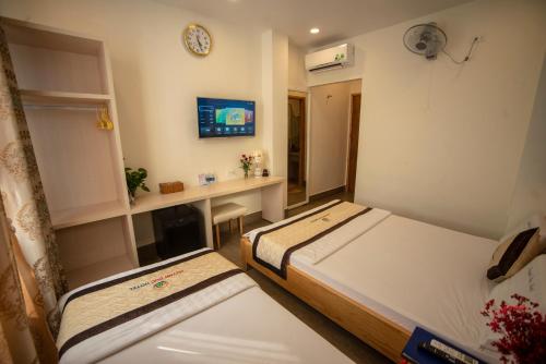 Krevet ili kreveti u jedinici u okviru objekta Huynh Duc 2 Hotel