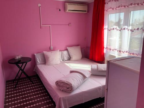 Ένα ή περισσότερα κρεβάτια σε δωμάτιο στο Hotel Continental