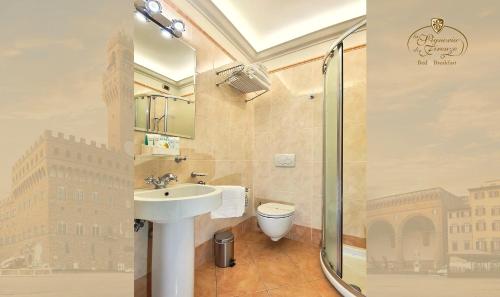 a bathroom with a sink and a toilet and a shower at B&B La Signoria Di Firenze in Florence