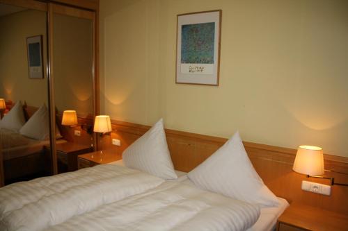 Postel nebo postele na pokoji v ubytování Hotel Mykonos