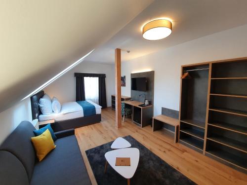 Una cama o camas en una habitación de Hotel KORTUS