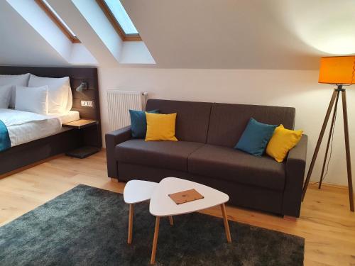 Una cama o camas en una habitación de Hotel KORTUS