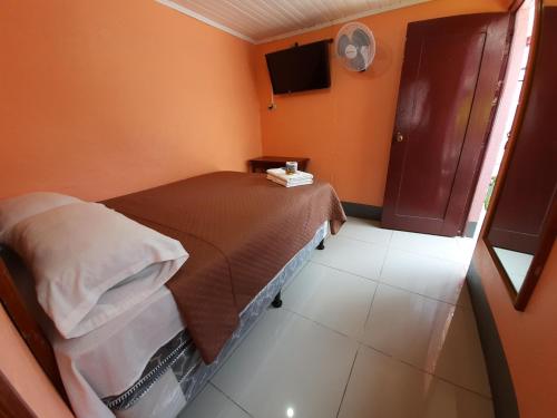 Ein Bett oder Betten in einem Zimmer der Unterkunft Hotel Fuentes