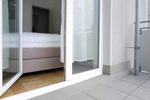 SC 06 by ROCKCHAIR Apartments l SUPERHOST Status l 4 Bedrooms Boxspringbeds 2 Bathrooms Balcony Elevator - Cozy Family & Business Flair welcomes you! photo 40
