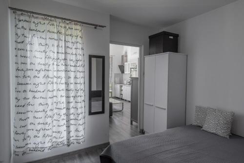 Кровать или кровати в номере Green House - Two Bedroom Apartment