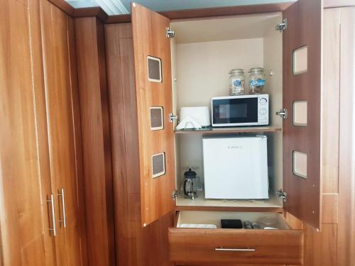 Kuchyň nebo kuchyňský kout v ubytování Highfields Self Contained Studio