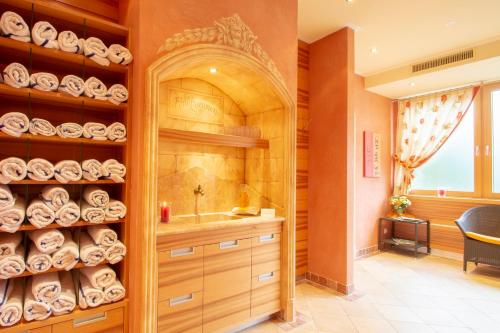 a bathroom with a sink and a counter at Hotel Engel Alberschwende in Alberschwende