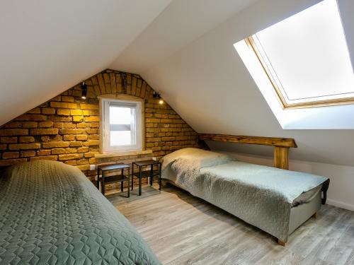 Postel nebo postele na pokoji v ubytování Apartament dwupoziomowy Ski&Bike