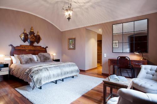 Un pat sau paturi într-o cameră la Can Borrell