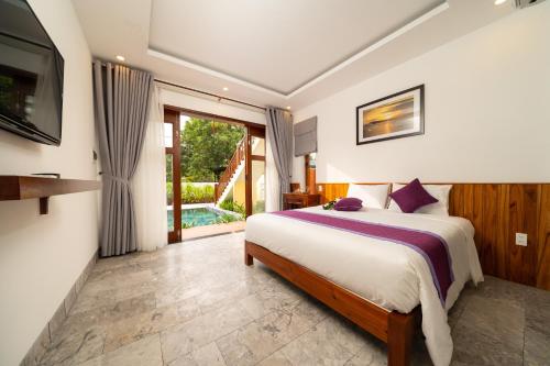 Кровать или кровати в номере Lama Beach Villa