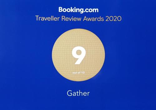 a gold circle with the number on it at Gather in Tainan