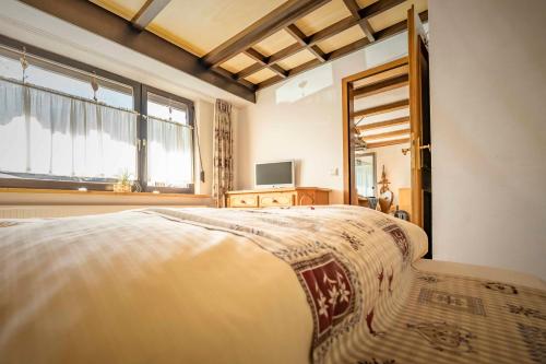 Cama o camas de una habitación en Ferienwohnung Linderspitzblick