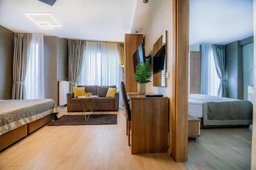 Krevet ili kreveti u jedinici u okviru objekta Kavalalı Suites