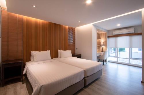 Voodi või voodid majutusasutuse The Residence Rajtaevee Hotel toas