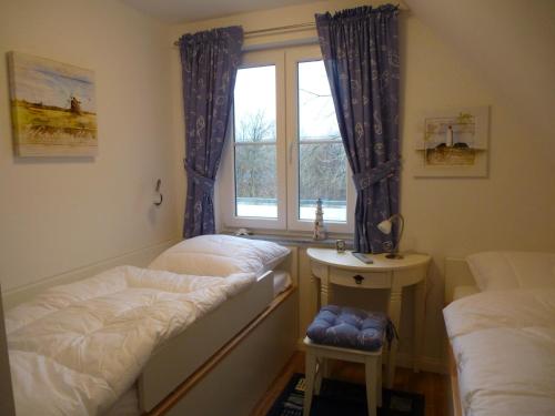 Postel nebo postele na pokoji v ubytování Ferienhaus Lucia