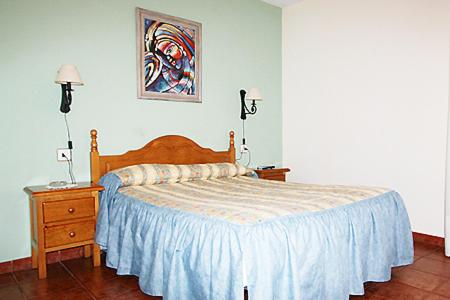 Katil atau katil-katil dalam bilik di Hotel Rural el Arco