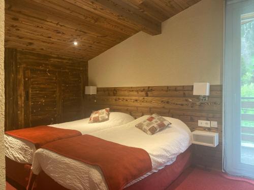 Postel nebo postele na pokoji v ubytování Auberge de la Dranse