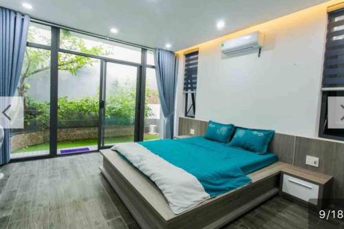 Ένα ή περισσότερα κρεβάτια σε δωμάτιο στο F.Home Modern & Art 3BR Near My Khe Beach