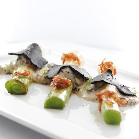 a plate with some food on a white plate at Domaine de Saint-Géry - Teritoria in Lascabanes
