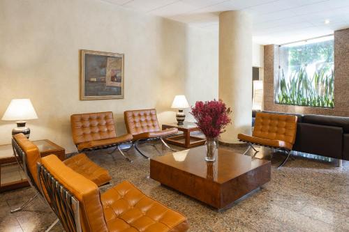 
A seating area at Hotel Rojas All Suite
