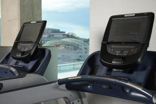 two screens on the back of a treadmill at Hotel Indigo Denver Downtown - Union Station by IHG in Denver