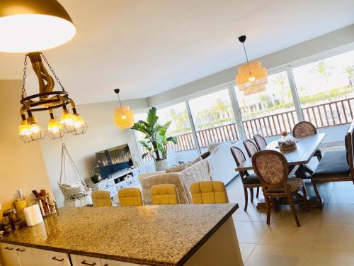a kitchen and dining room with a table and chairs at Almaza bay Beach Town Chalet in Marsa Matruh