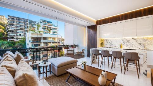 a living room with a couch and a table at PIER 57 - 609 2 BR Amazing Roof in Romantic Zone in Puerto Vallarta