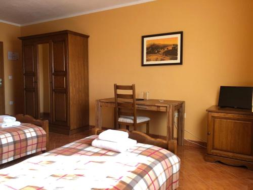 Ένα ή περισσότερα κρεβάτια σε δωμάτιο στο Bed and Breakfast Albatros