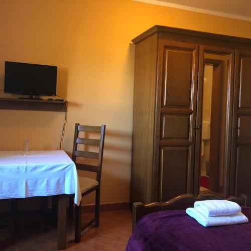 Ένα ή περισσότερα κρεβάτια σε δωμάτιο στο Bed and Breakfast Albatros