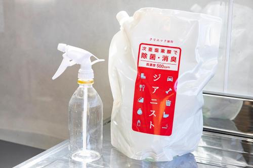 a plastic bag next to a bottle of soap at Hakodate Stoke Hills in Hakodate