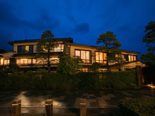 an exterior view of a house at night at Shinpuro in Miyazu